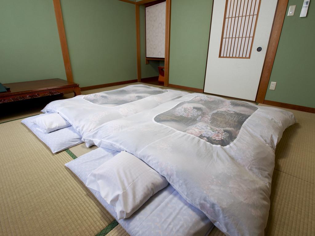 Отель Sazu Onsen Yusho Ками Номер фото