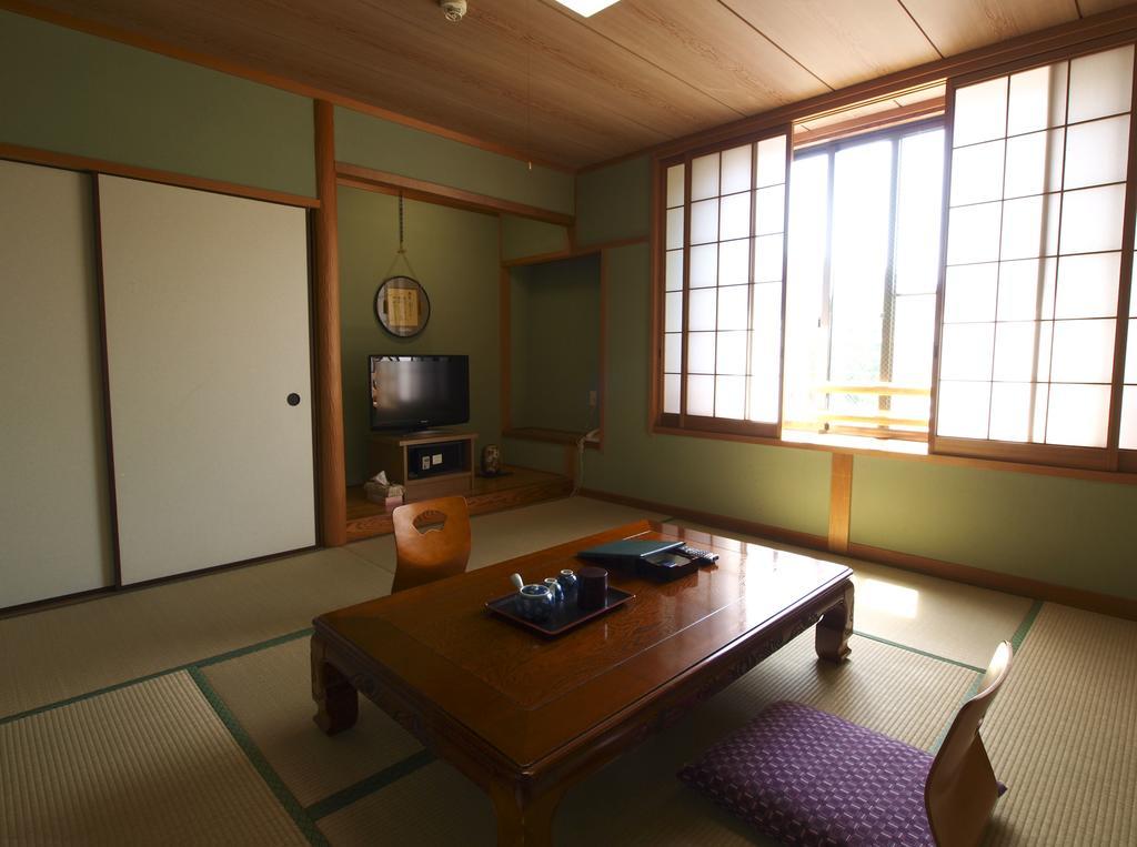 Отель Sazu Onsen Yusho Ками Номер фото