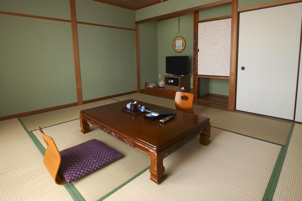 Отель Sazu Onsen Yusho Ками Номер фото