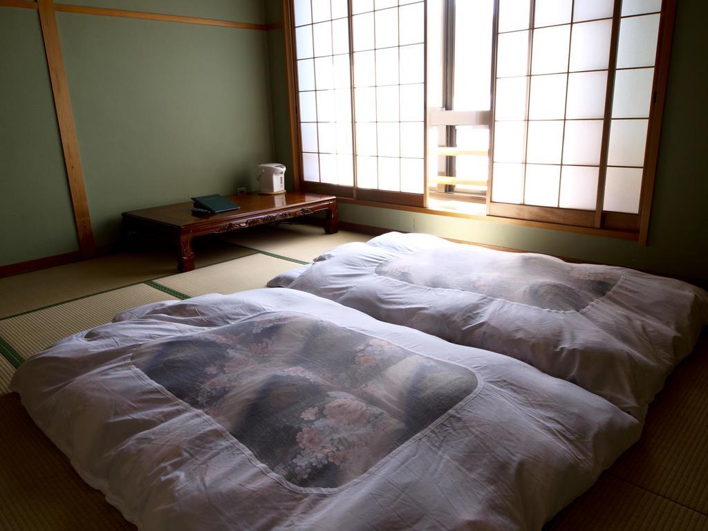 Отель Sazu Onsen Yusho Ками Номер фото